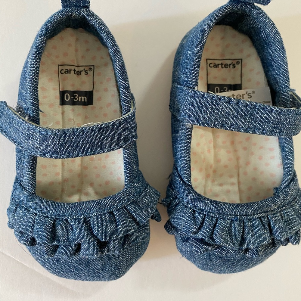Carter’s 0-3 mo never been used flats